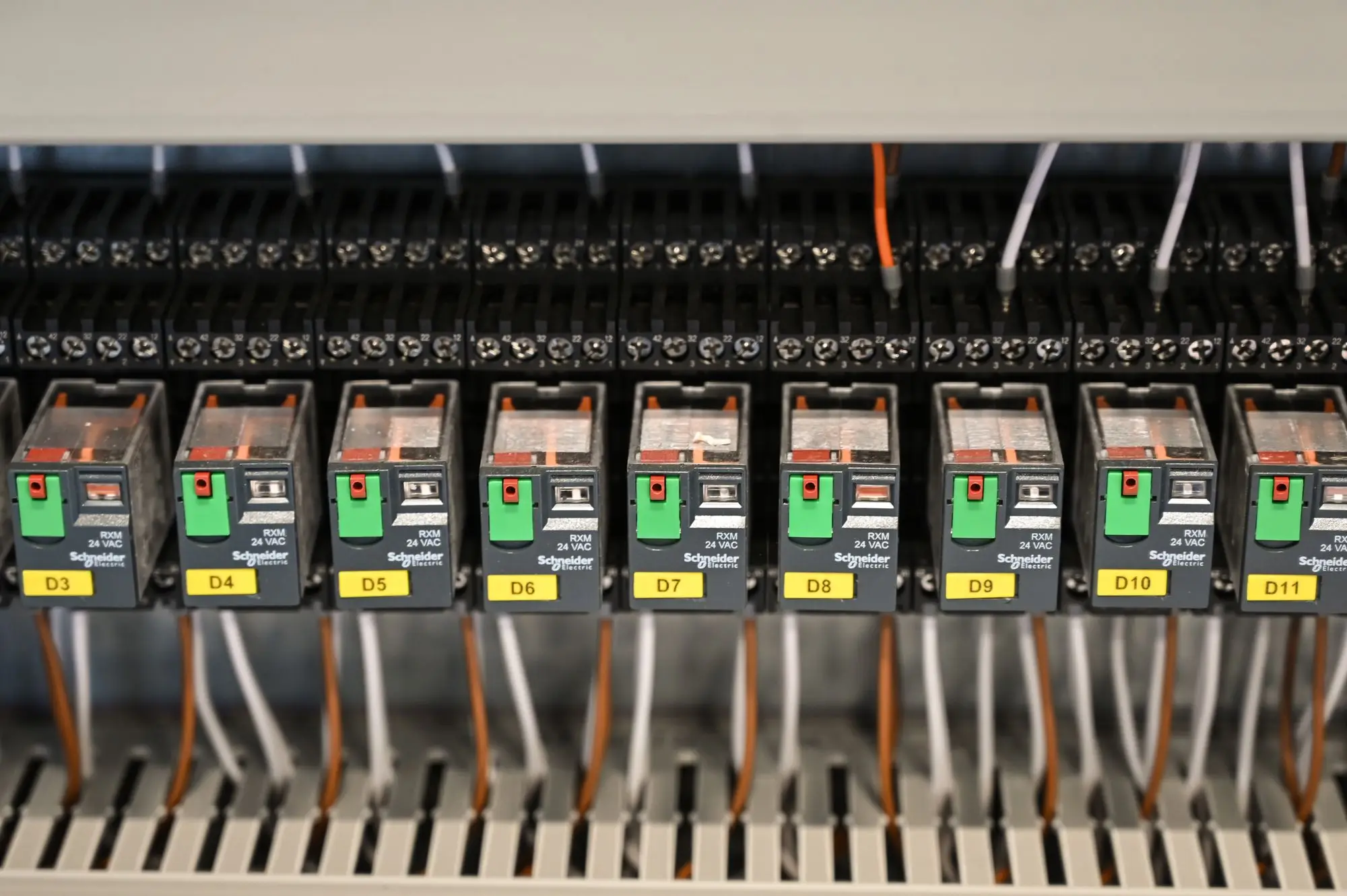 Close detail of protective devices mounted inside a panel